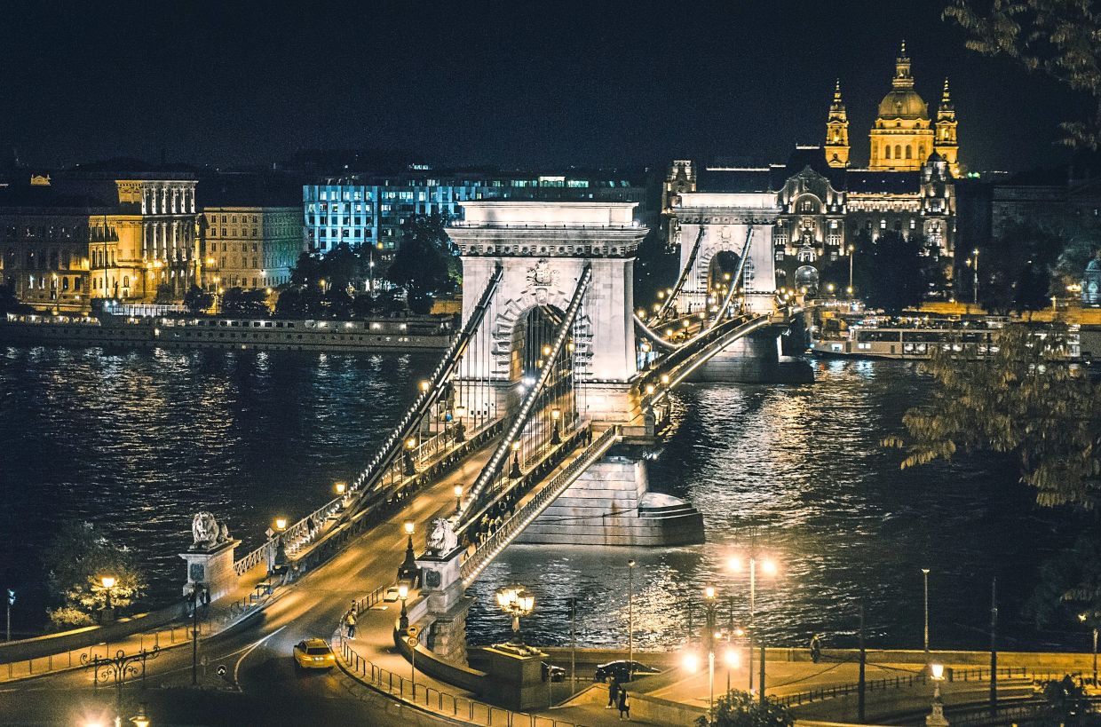 ONLINE Szechenyi Chain Bridge is the main link between the two cities, Buda and Pest. — LUCAS DAVIES/Unsplash 