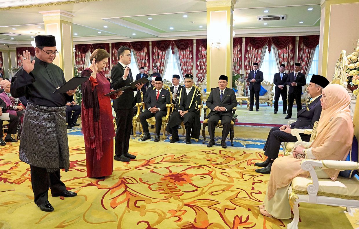 Duty-bound: (From left) Datuk James Ratib, Liew and Phoong at the swearing-in ceremony in Istana Seri Kinabalu. They took their oath before Sabah Governor Tun Juhar Mahiruddin (second from right). — Bernama