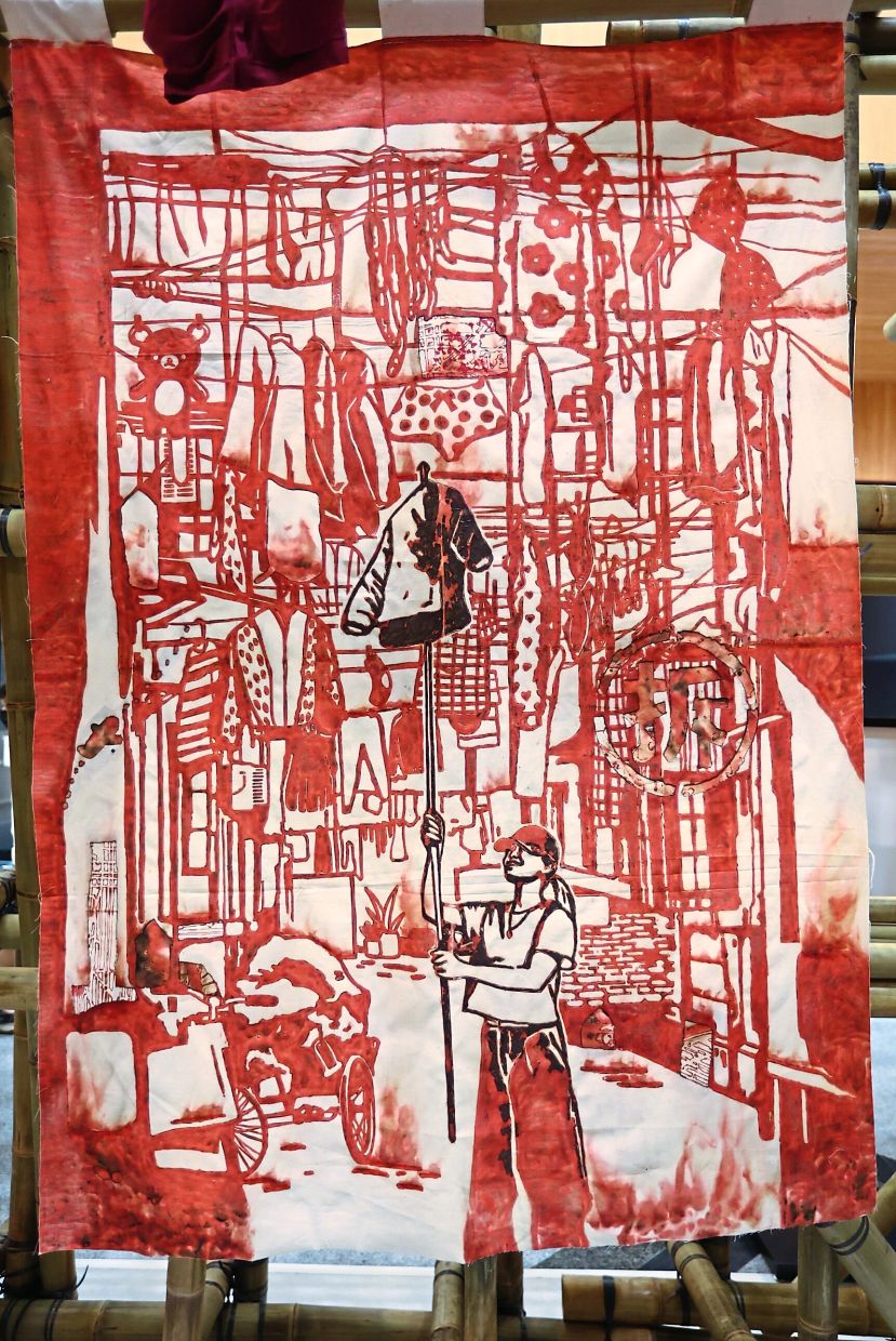 'Red Hanging Laundry' (burnt red calligraphy paper and pigment on canvas, 2023). Photo: The Star/Azman Ghani