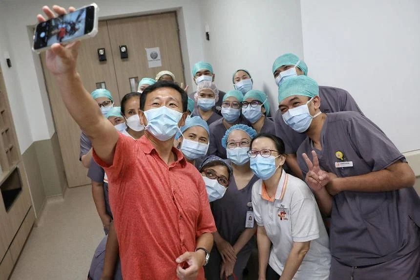 Past year was tough for healthcare workers, dealing with three Covid-19 waves, says Singapore health minister - Vimarsana News