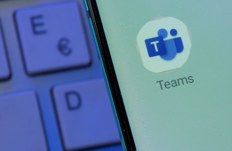 FILE PHOTO Microsoft Teams app is seen on the smartphone placed on the keyboard in this illustration taken July 26 2021. REUTERSDado RuvicIllustration