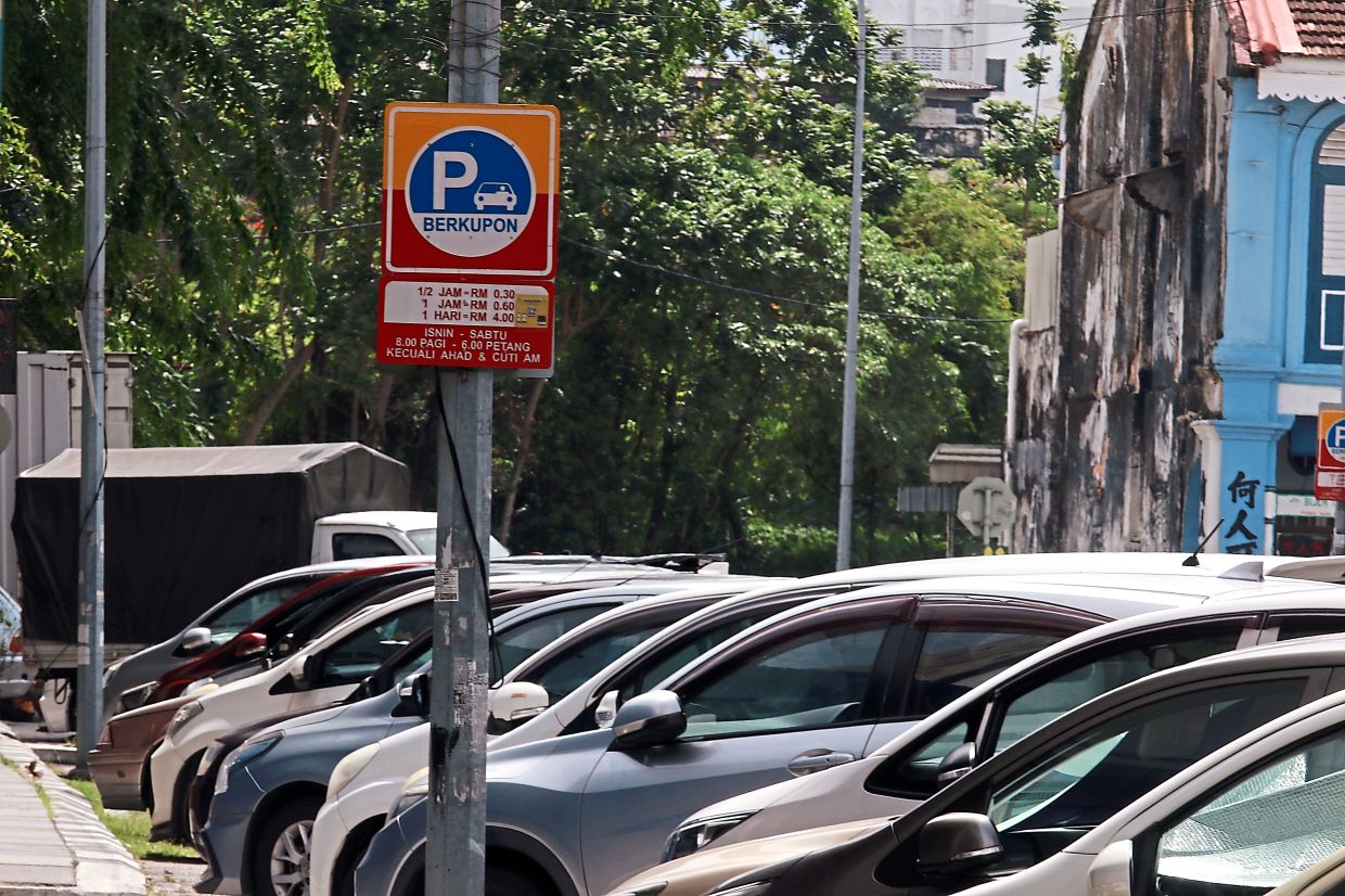 Parking bays along Jalan Bijeh Timah are always occupied.