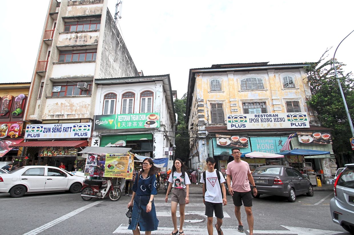 The growing number of tourists in Ipoh Old Town is making it difficult for people to find parking bays.