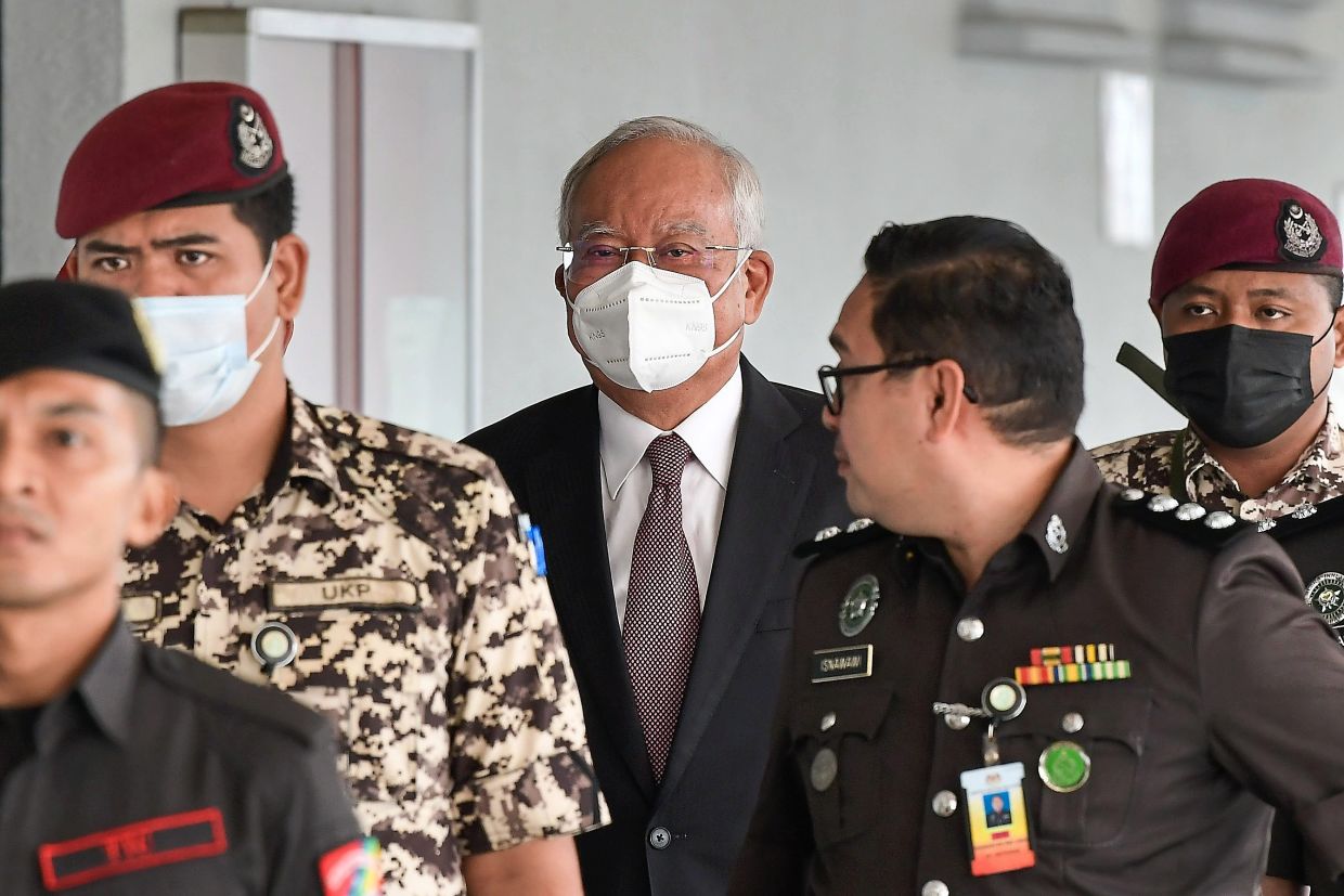 Day in court: Najib arriving at the Kuala Lumpur Courts Complex. — Bernama