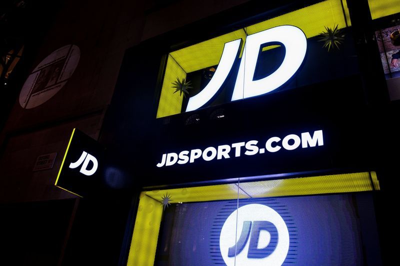 FILE PHOTO JD Sports logo is seen on the exterior of a store in London Britain November 17 2021. Picture taken November 17 2021. REUTERSMay James
