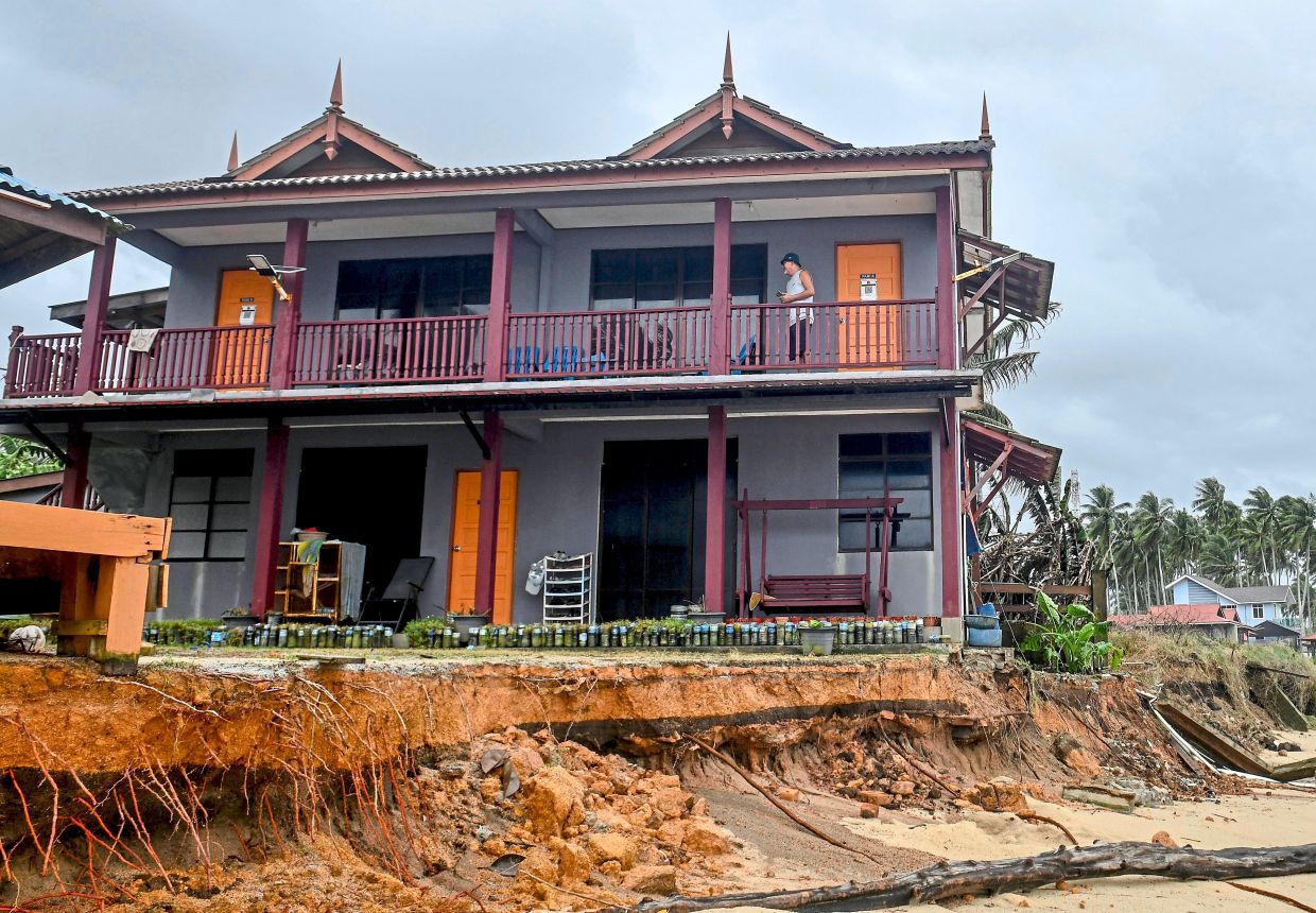 Evidence of nature’s power: Erosion from high tides has caused parts of the structure of the resort in Kampung Kolam, near Kuala Nerus in Terengganu, to collapse,