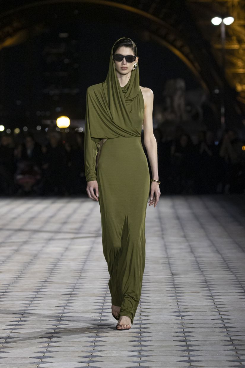 Hooded gowns, jumpsuits and dresses made up half of this label's SS23 collection. Photo: Saint Laurent