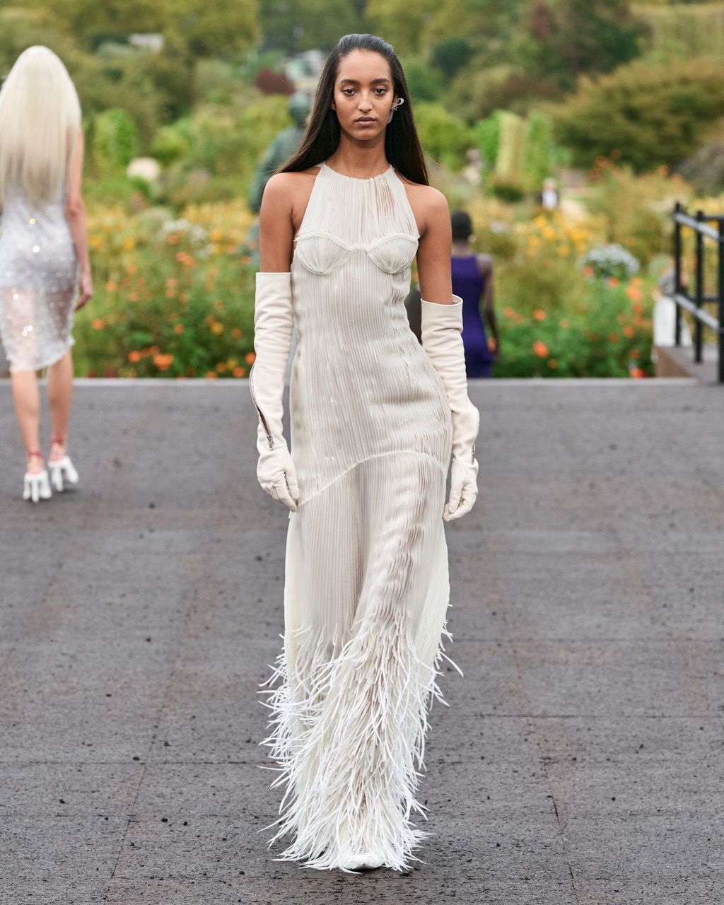 A stunning white halter neck gown with fringe details. Photo: Givenchy