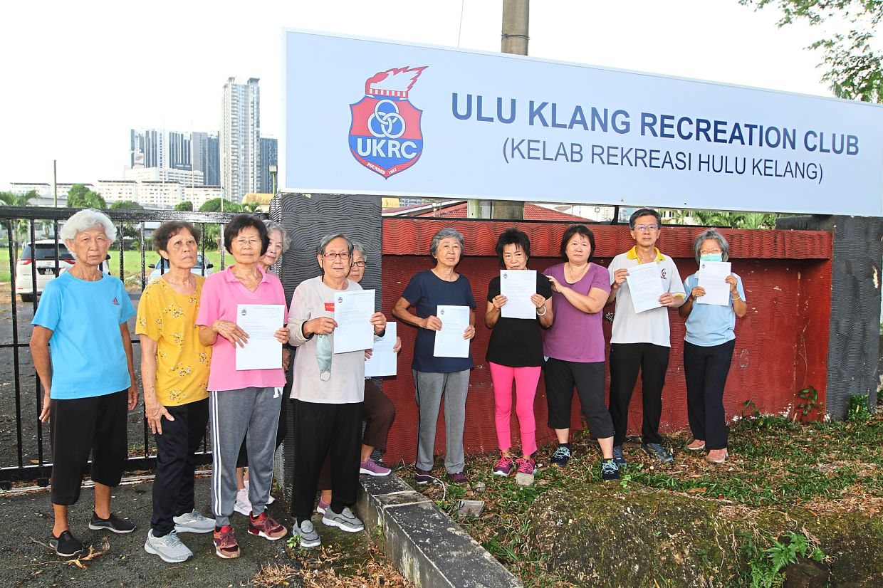 Residents showing copies of the letter received from the club’s management, requesting their details.