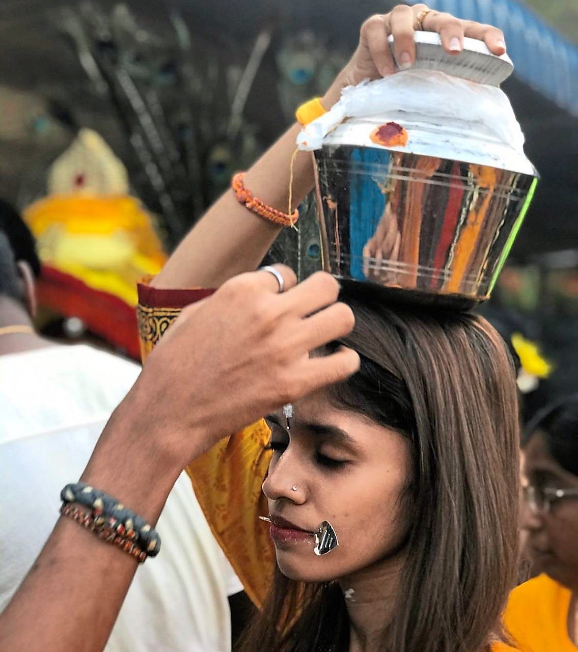 Heama has been carrying a paal kudam for Thaipusam since she was in primary school.