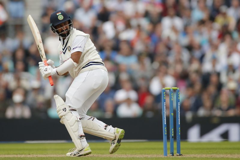 Cricket CricketSlow but steady, India's Pujara constructs another