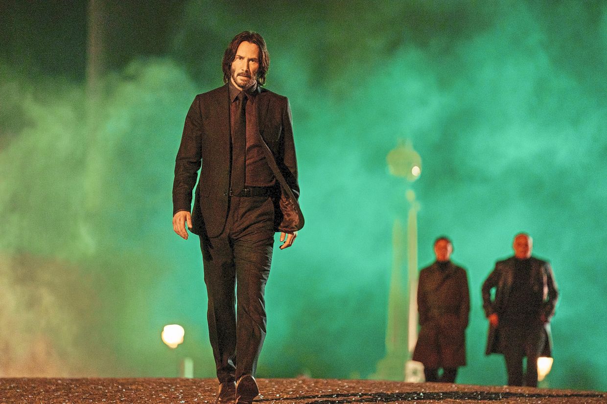 A class of peptides that have shown promising effects against the Botrytis cinerea fungus has been named after Reeves, seen here in a scene from John Wick: Chapter 4. — Lionsgate