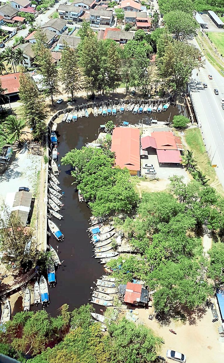 Darkish canal: Sungai Lereh waterway has changed into a dark colour due to the pollution. — Picture taken by a resident, Andrea Geni Finta