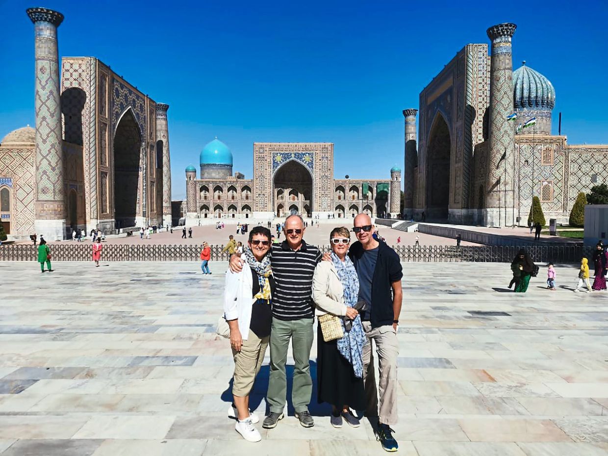 The reader (second from left) and his family and friends at Regisan in Samarkand.