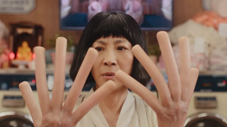 Michelle Yeoh's 'hot dog hands' in 'Everything Everywhere All At Once' sold for RM246,000 at auction - Vimarsana News