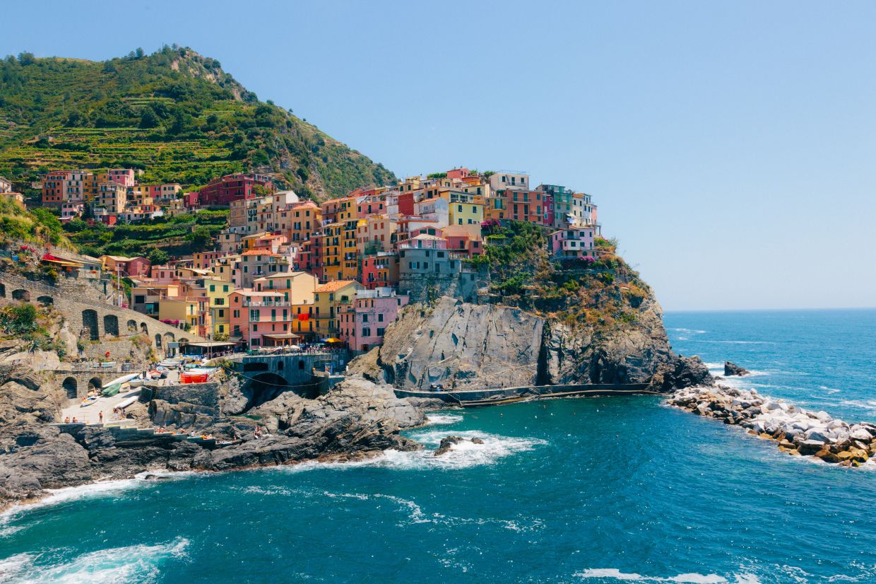 Manarola is a charming small village in Cinque Terre, Italy, with its multicoloured houses in the hills overlooking the sea. Fishing and wine-making are the main activities here