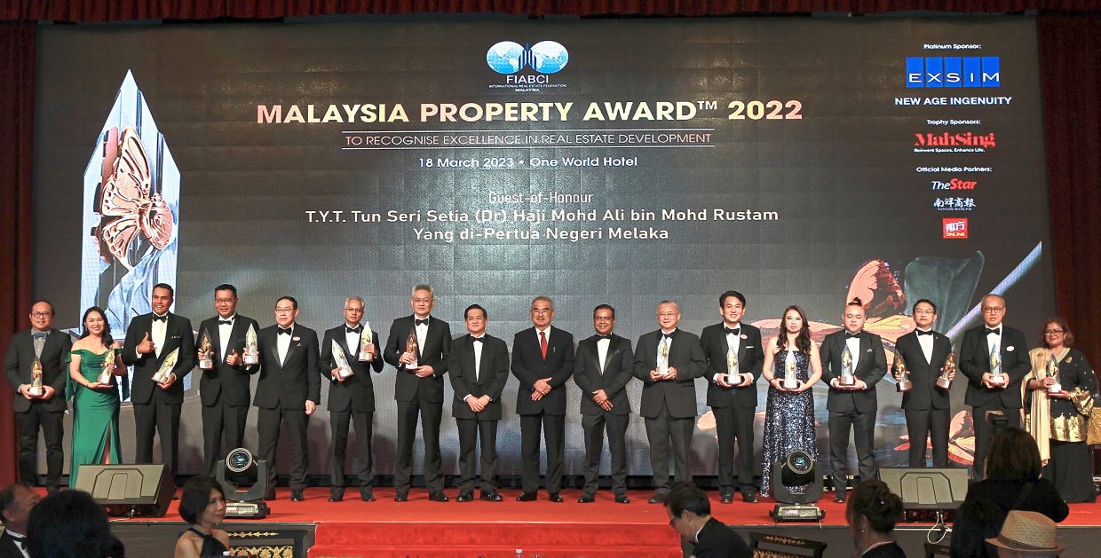 One for the album: Mohd Ali (centre) in a group photo with all the winners of Fiabci Malaysia Property Award 2022 during the Malaysia Property Awards Gala Dinner 2022. — CHAN TAK KONG/The Star