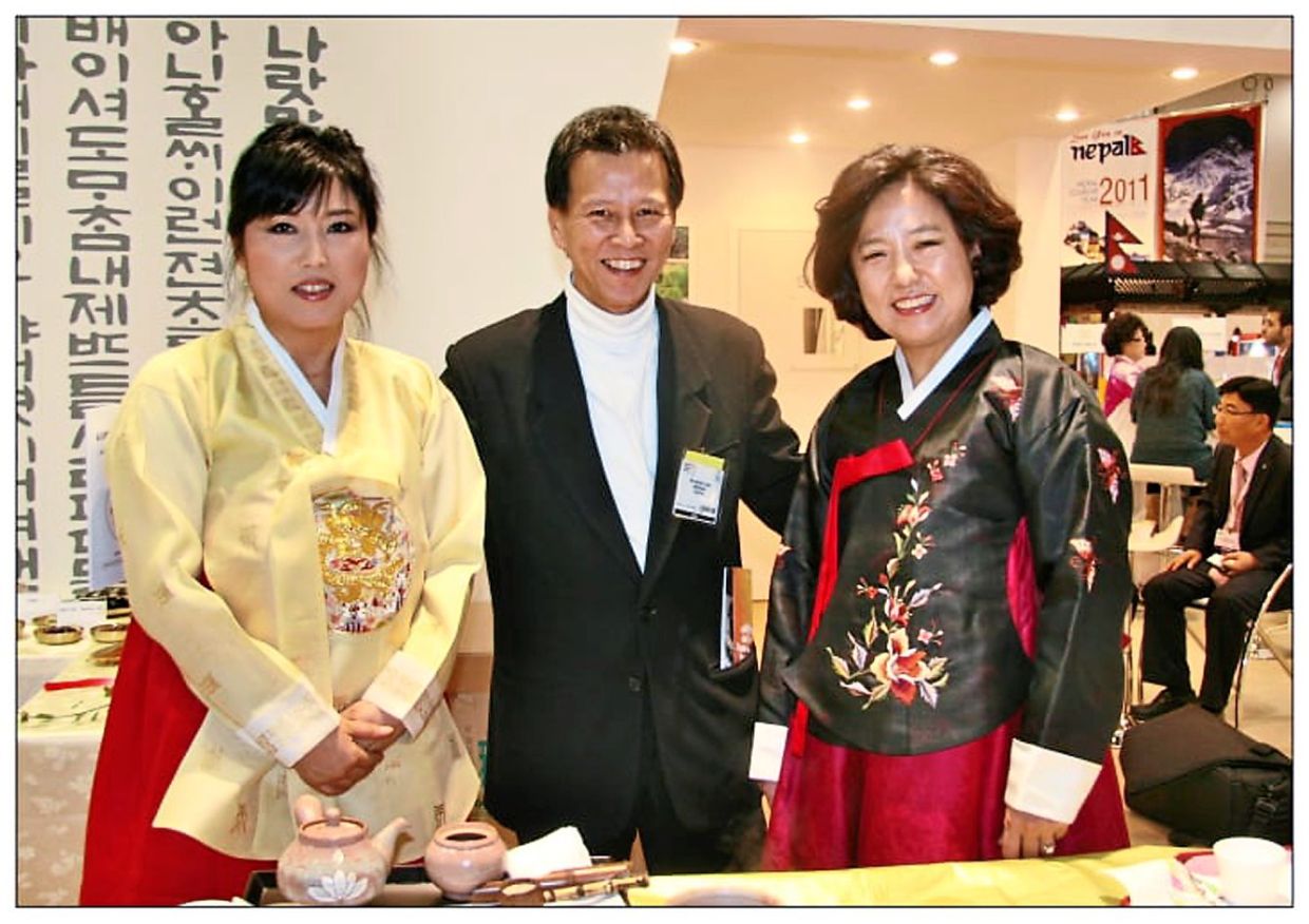 Chen (middle) with representatives from the Korea Tourism Organisation at the World Travel Market exhibition in London some years back. — Photos: ANDREW CHEN