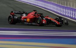 Motor racing-Drivers find few positives in 'too slow' Ferrari