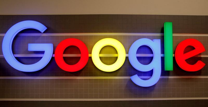FILE PHOTO An illuminated Google logo is seen inside an office building in Zurich Switzerland December 5 2018. REUTERSArnd WiegmannFile Photo