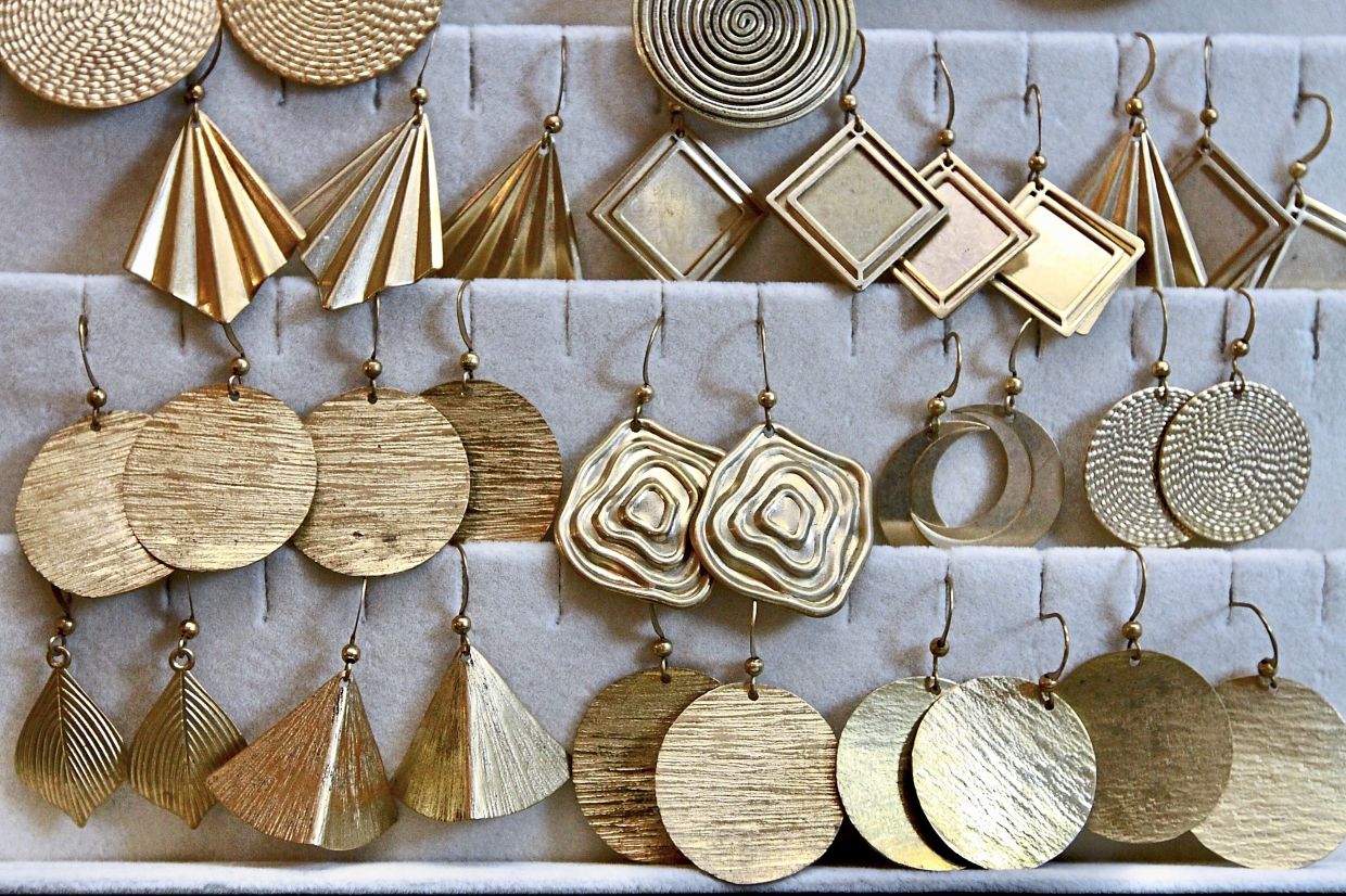 Brass earrings in Labunda’s jewellery collection. 