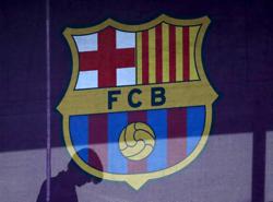 Soccer-UEFA opens investigation into Barca payments to ex-refereeing official