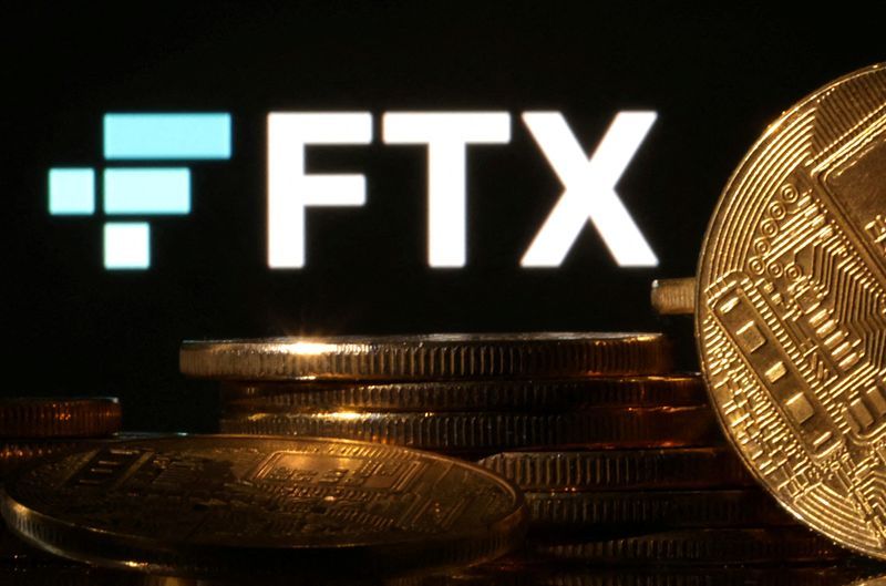 FILE PHOTO Representations of cryptocurrencies are seen in front of displayed FTX logo in this illustration taken November 10 2022. REUTERSDado RuvicIllustrationFile Photo