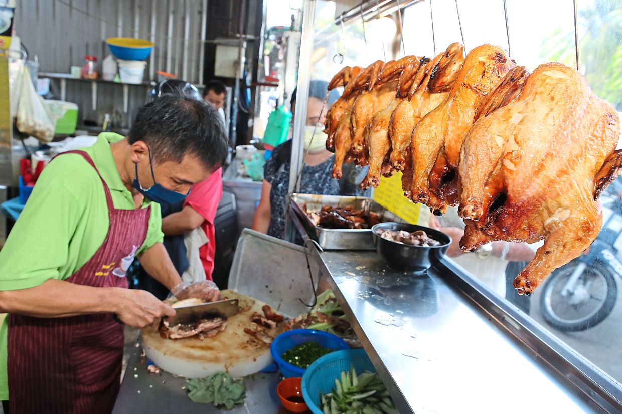 Long lines for RM3 per plate chicken rice The Star