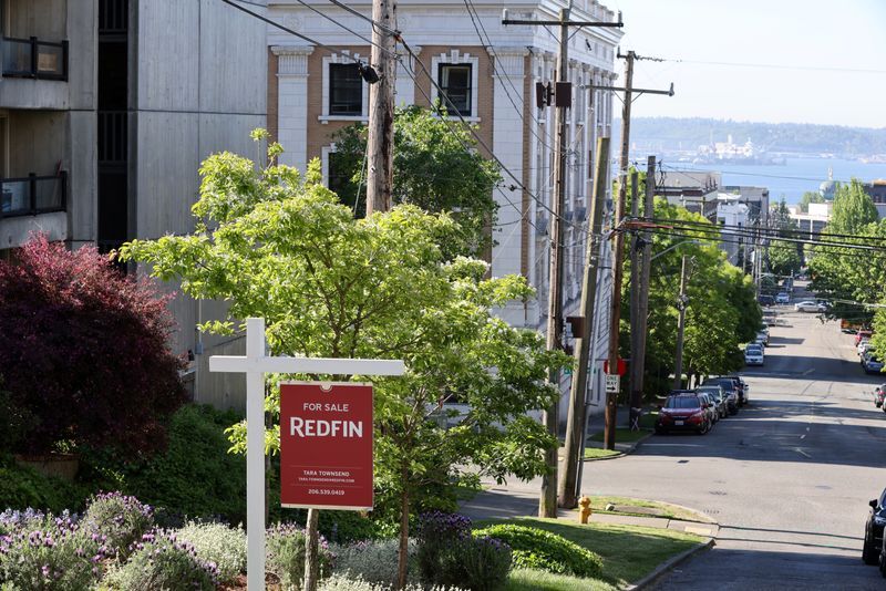 A quotFor Salequot sign is posted outside a residential home in the Queen Anne neighborhood of Seattle Washington U.S. May 14 2021.   REUTERSKaren Ducey