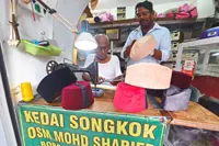 An heir for Penang’s songkok master