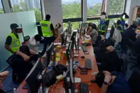 Scam and illegal betting ring busted, 21 nabbed in KL