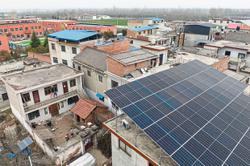 Beijing takes climate fight to the rooftops