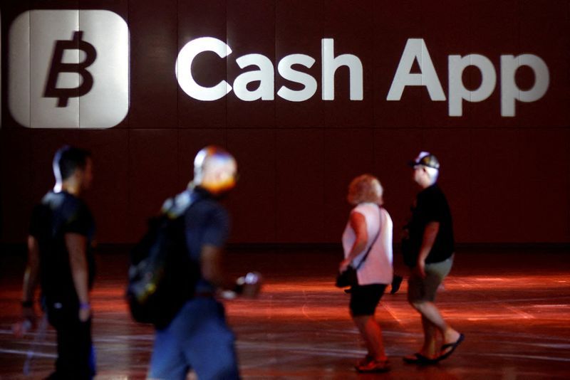 FILE PHOTO The logo of Cash App is seen at the main hall during the Bitcoin Conference 2022 in Miami Beach Florida U.S. April 6 2022. REUTERSMarco Bello