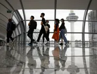Singapore sees rare travel delays as tech problem hits immigration checkpoints