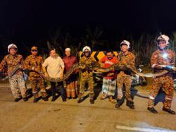 Bomba captures 7m-long python caught in drain near Sekinchan mosque