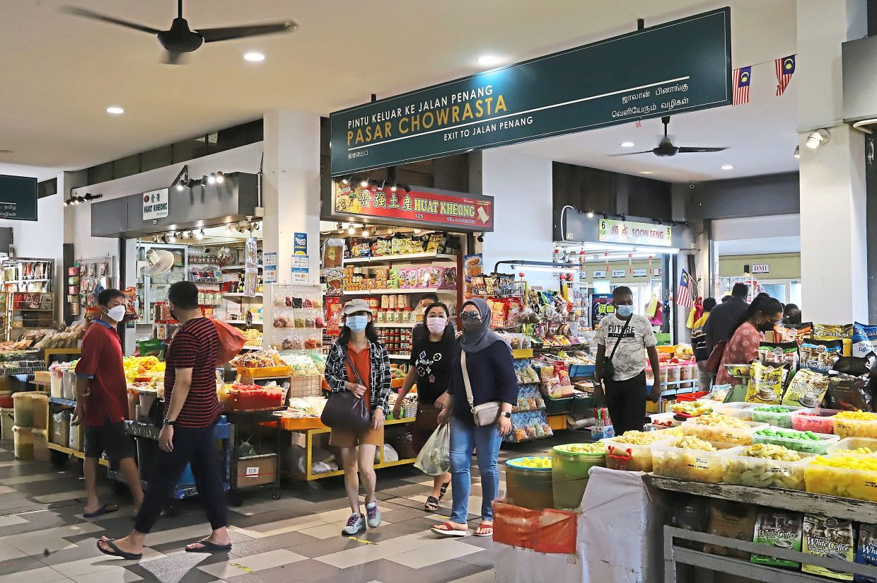 Visitors are bound to discover old world wonders and trades at the Chowrasta Market.