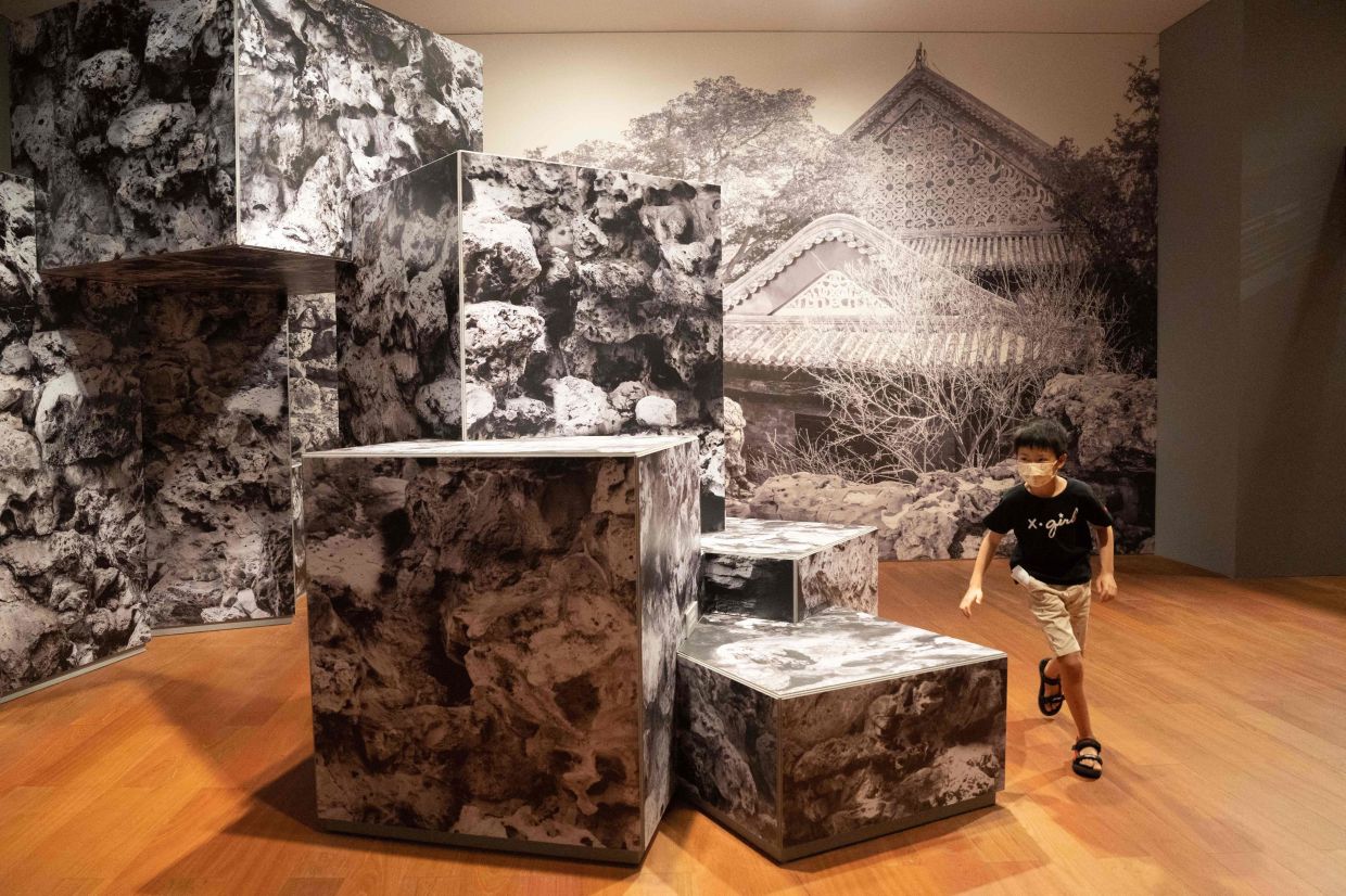For some exhibits, children can enjoy the interactive museum experience. - AFP