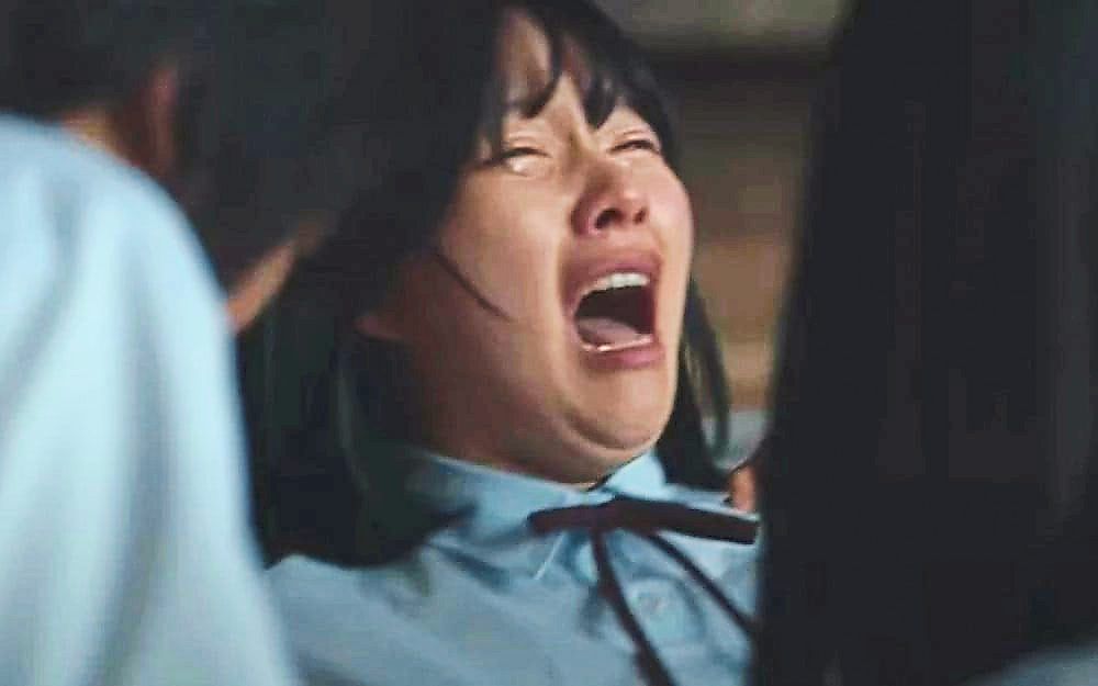 A schoolgirl being bullied in Netflix's school violence-revenge series 'The Glory.' – Netflix