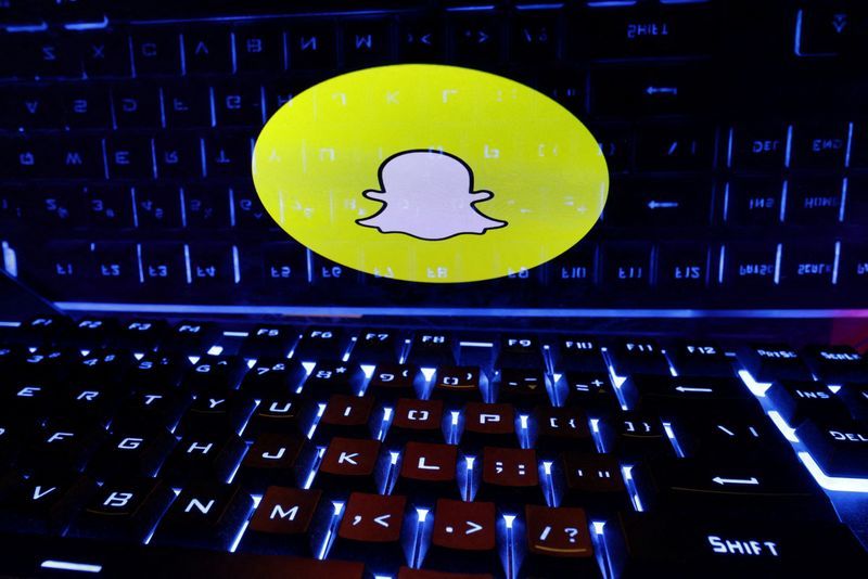 FILE PHOTO A keyboard is placed in front of a displayed Snapchat logo in this illustration taken February 21 2023. REUTERSDado RuvicIllustrationFile Photo