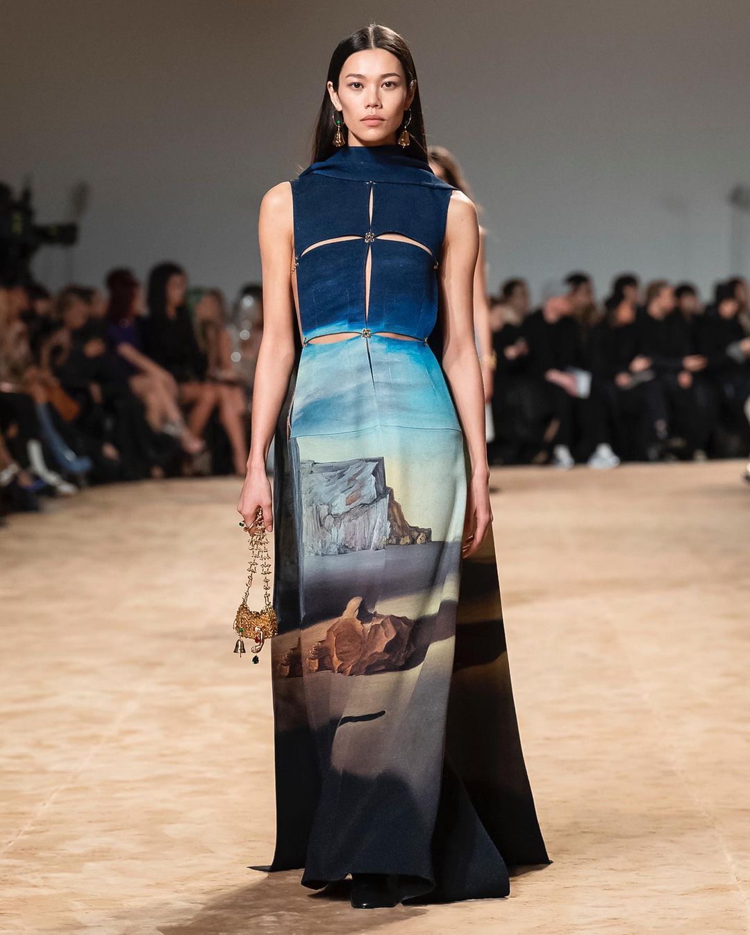 'Shades Of Night Descending', the famous painting by Dali, is seen on this Paco Rabanne dress. Photo: Instagram/Paco Rabanne