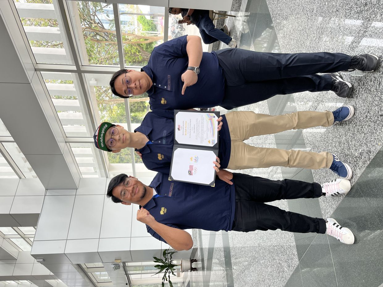 Cheong (centre), with assistant national team manager Megat Danish Izmeer and Muhammad Farouq Abdul Patah, member of the SEA Games Task Force Committee, will be leading the charge. — ANDREW CHEONG