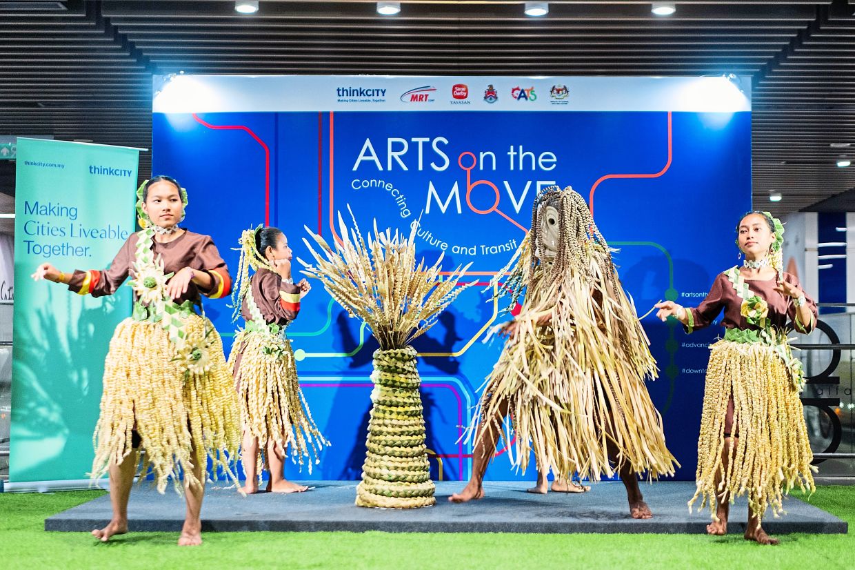 Performance by the Mah Meri Cultural Village troupe during the launch of Think City's Arts On The Move event at the Pasar Seni MRT Station in KL.