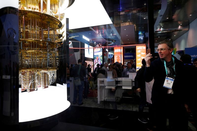 FILE PHOTO A man takes a photo of a model of the IBM Q System One quantum computer during the 2020 CES in Las Vegas Nevada U.S. January 7 2020. REUTERSSteve MarcusFile Photo