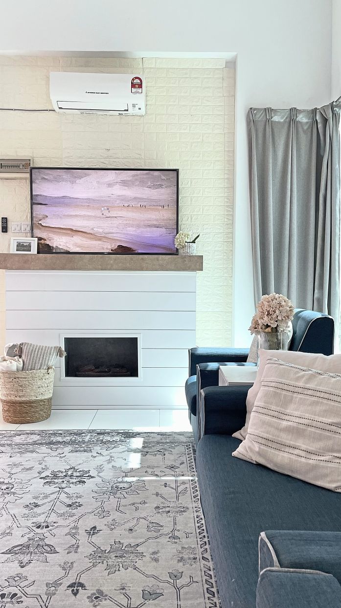 The faux fireplace done up by Nor Shakila's friend.