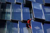 'French Spiderman' climbs Paris skyscraper as protest against pension law