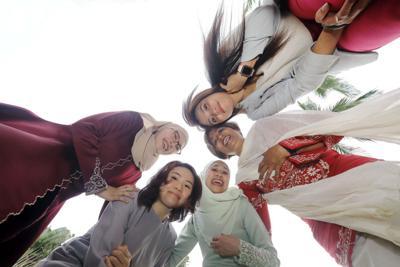 Umi Syafira Azmi, Tang Lai Sun, Nurul Najwa Roslan, Hema Sundram and Syana Fadzil during the Hari Raya celebration. — AZLINA ABDULLAH/The Star
