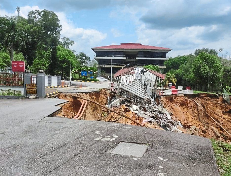 Washed away: A landslide destroyed a guard post at Maca. No casualties were reported. — Picture courtesy of KL Bomba