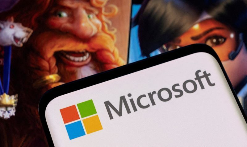 FILE PHOTO Microsoft logo is seen on a smartphone placed on displayed Activision Blizzards games characters in this illustration taken January 18 2022. REUTERSDado RuvicIllustrationFile Photo