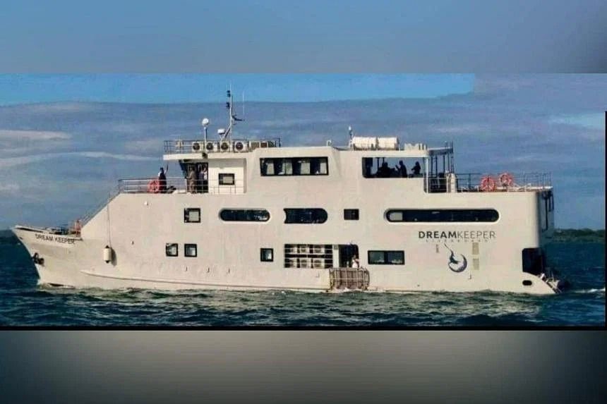 Four missing after dive boat sinks at World Heritage reef in the