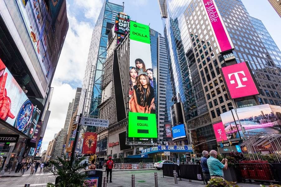 Dolla is featured on the Times Square billboard in New York City.